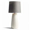Ceramic table lamp with gray fabric shade and textured base 30 x 30 x 60cm